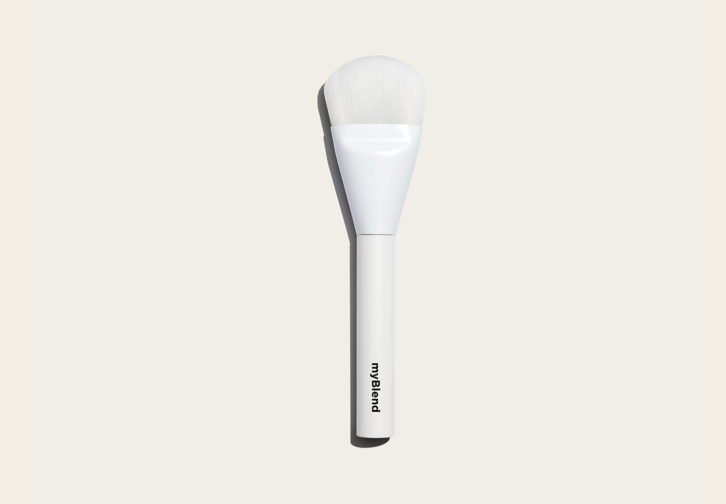 Pinceau applicateur de soin visage.